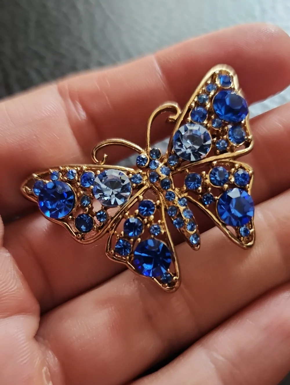 Gold-Tone Butterfly Brooch with Blue Crystal Accents